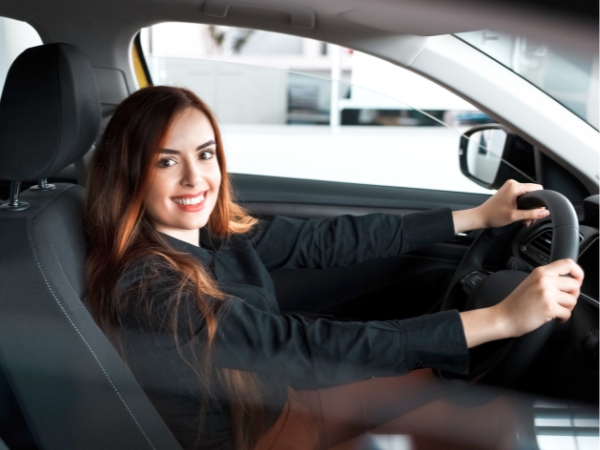Woman Driving a Car