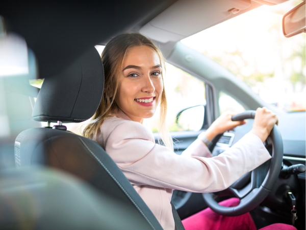 Woman Driving a Car