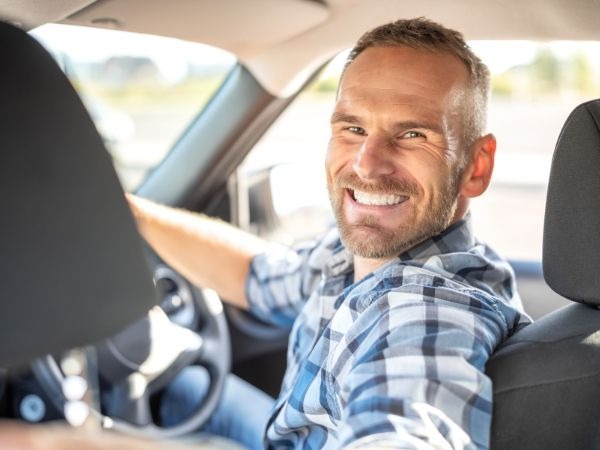 Man Driving a Car