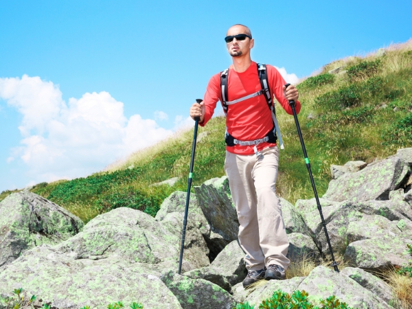 Man Hiking a Mountain