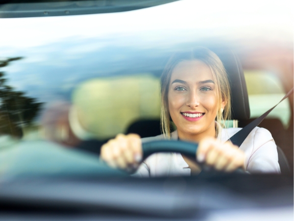 Woman Driving a Car